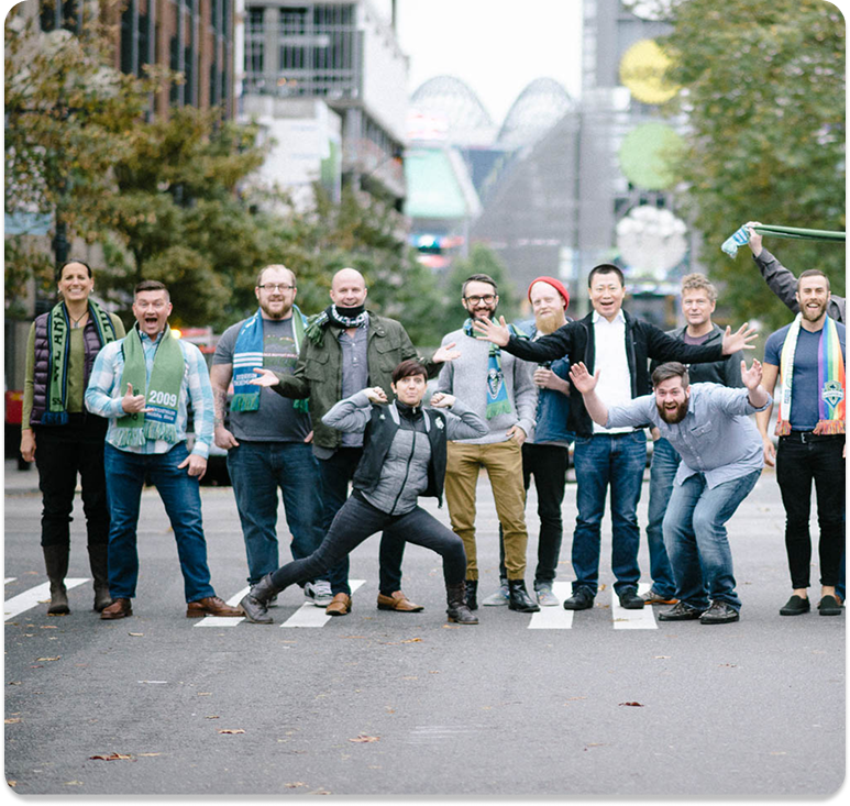built mighty team acting silly on street crosswalk in seattle